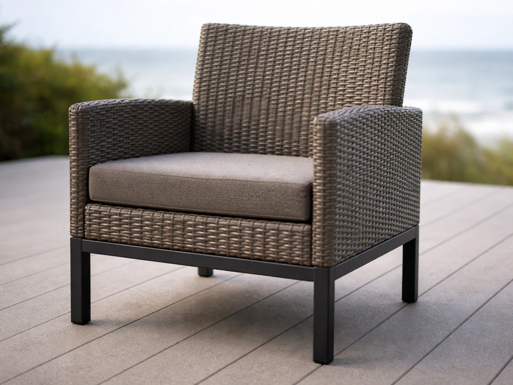Close-up of intact synthetic resin wicker over an aluminum frame in bright outdoor light.