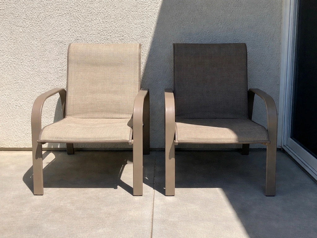 Outdoor chair fabric swatches: one sun-faded in direct light, one intact in shade beside it.
