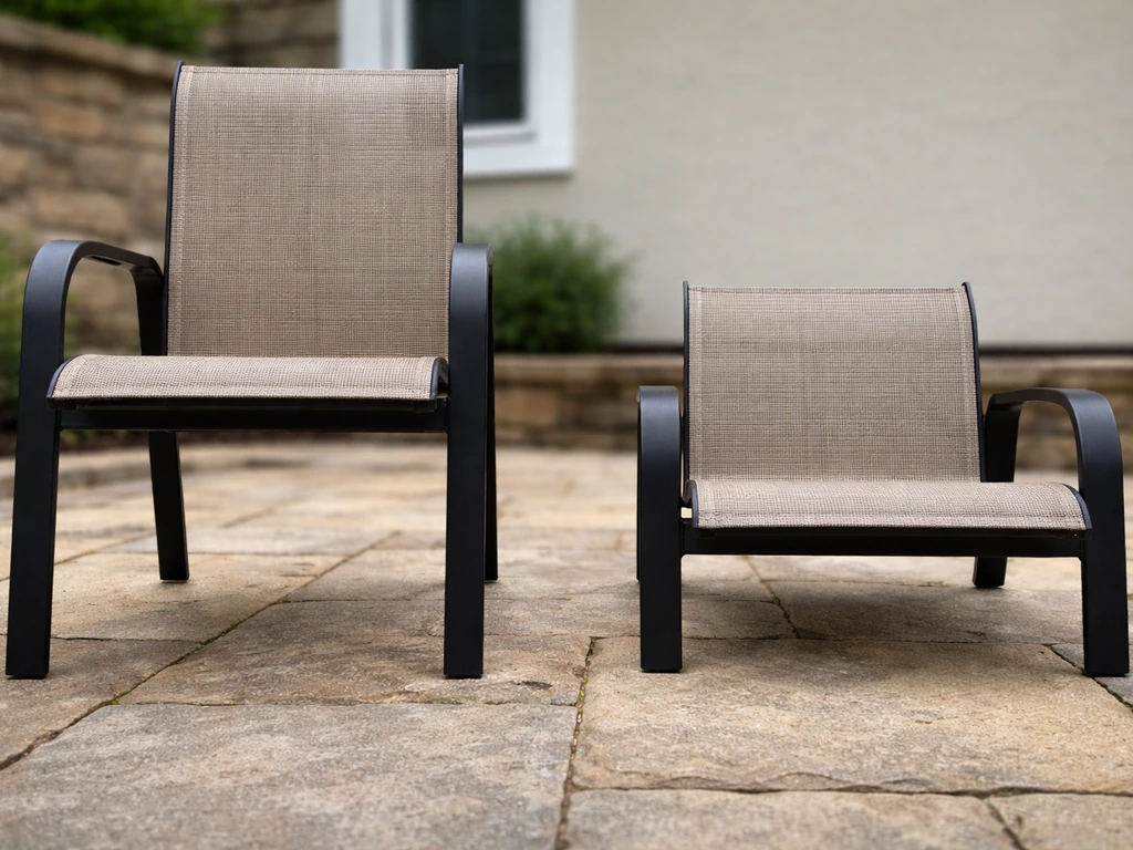 Side-by-side patio chairs showing standard versus noticeably lower seat height above the ground.