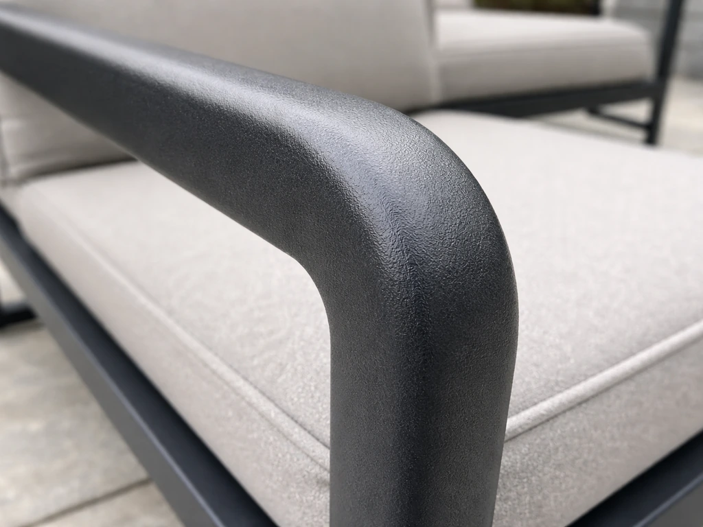 Close-up of matte powder-coated aluminum outdoor furniture tubing and edges with no rust.